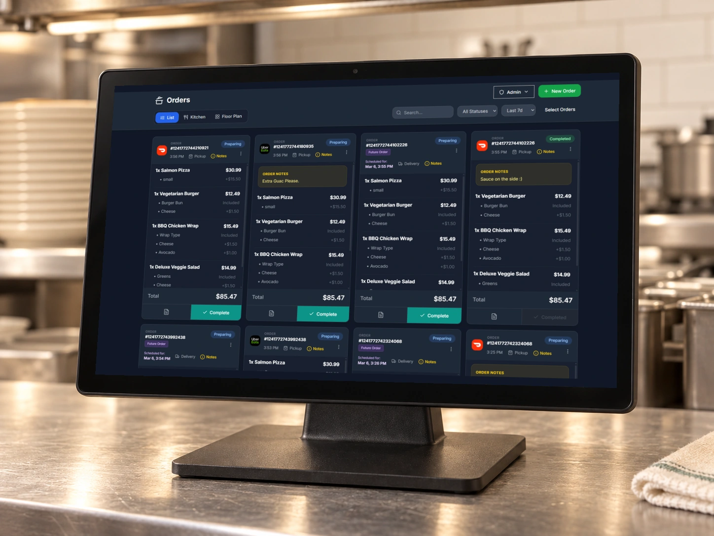 Dashi order queue on a modern touchscreen terminal at a stainless-steel kitchen pass